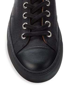 Common Projects
Tournament Low Top Canvas Sneakers